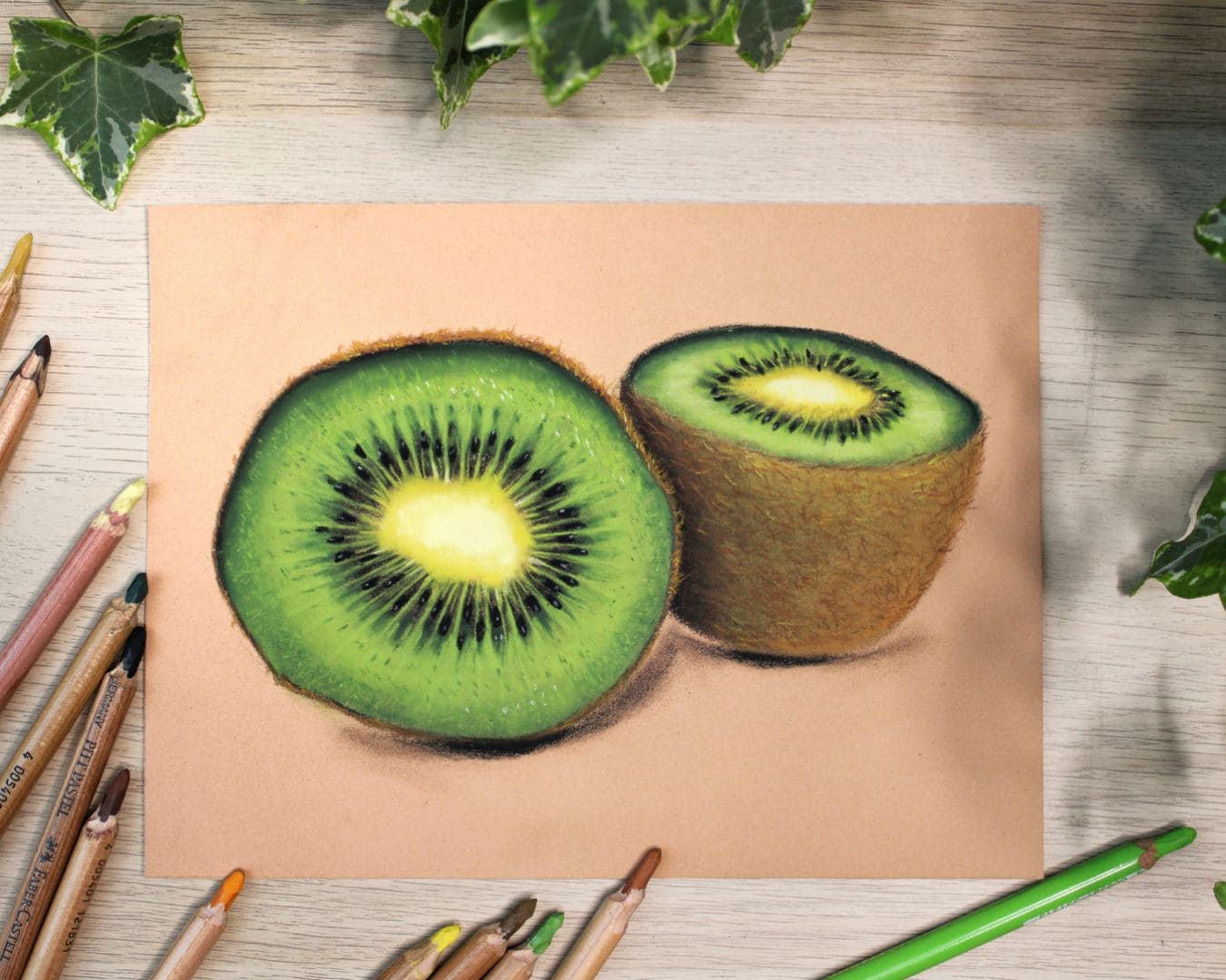 dessin pastel sec d'un kiwi coupé en deux